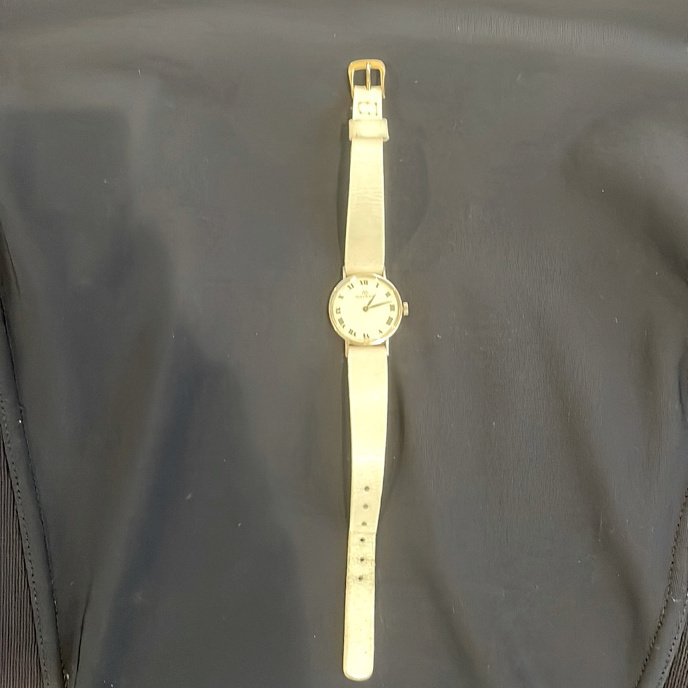Small face MOVADO vintage watch. Not the original band.